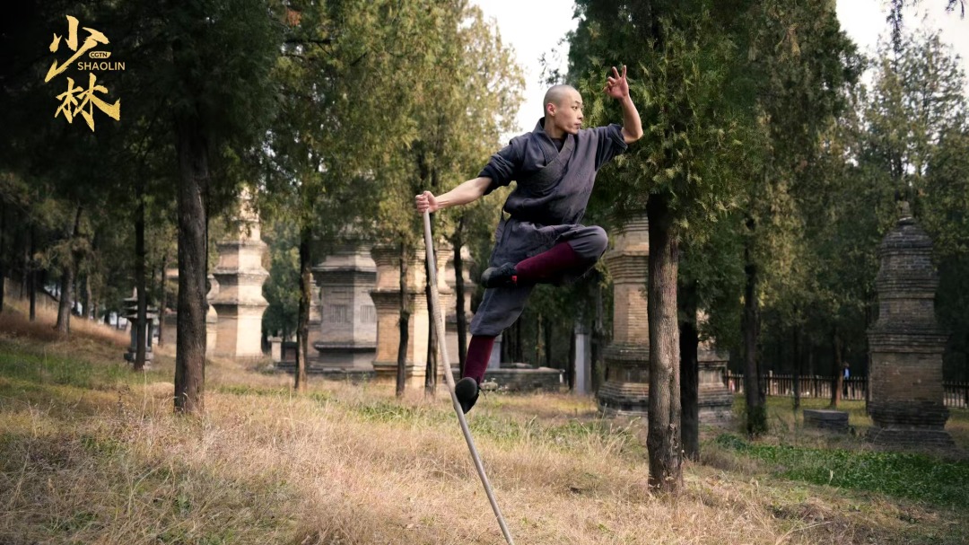 Shi Yanming showcases the classic Monkey Stick gesture in the Pagoda forest of Shaolin Temple, central China's Henan Province, December 8, 2024.