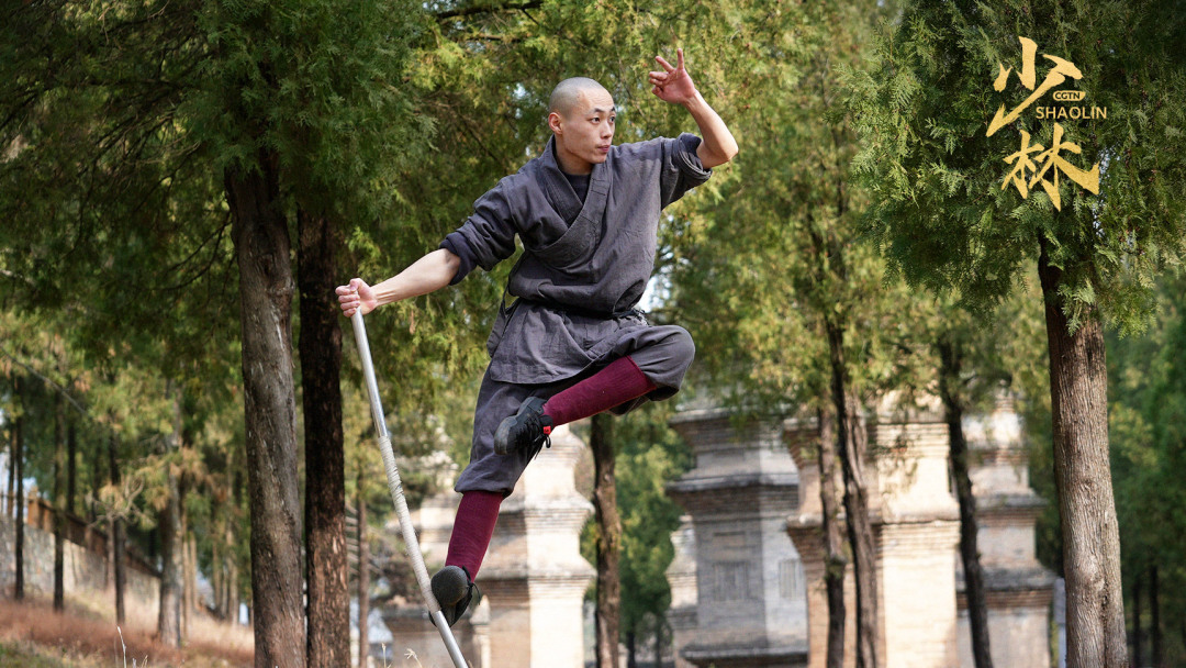 Shi has practiced over a month to learn the Monkey Stick moves.