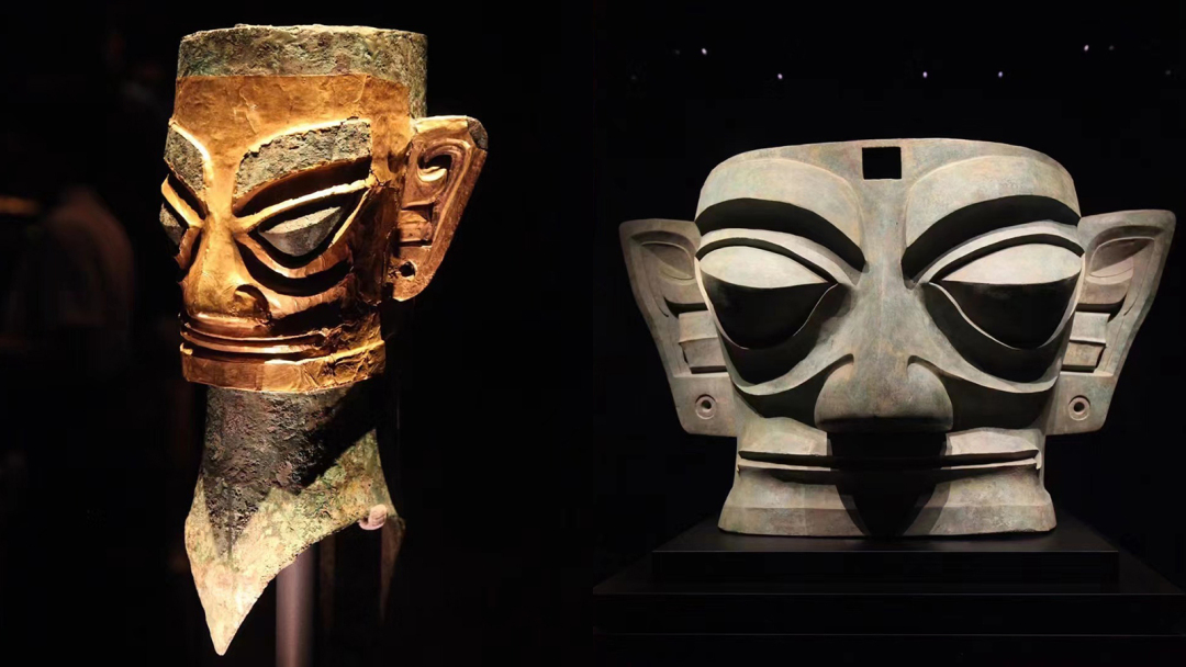 A bronze head with a gold mask (left) and a bronze mask are seen on display at the Sanxingdui Museum in Guanghan, Sichuan Province. /CGTN