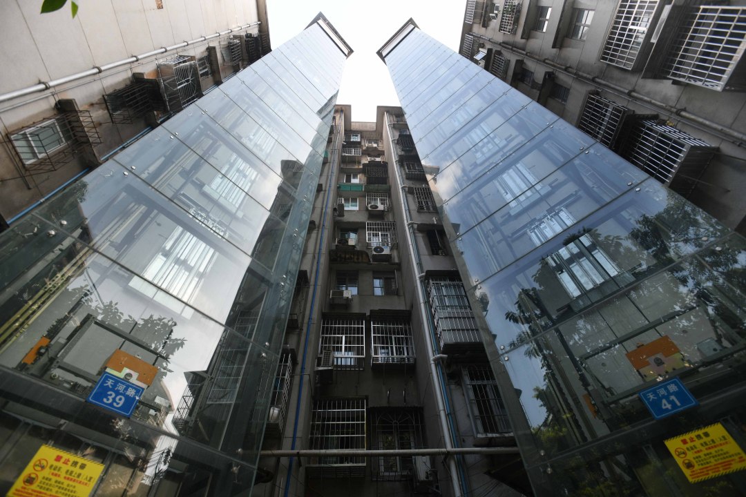 邱伟荣-(报纸图)广州全市已加装电梯超1.5万台-FZ100413828415.JPG 邱伟荣-(报纸图)广州全市已加装电梯超1.5万台-FZ100413828415.jpg