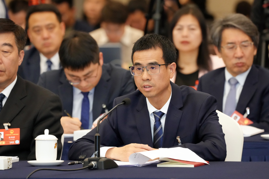 莫伟浓20260306十四届全国人大四次会议广东省代表团举行全体会议
